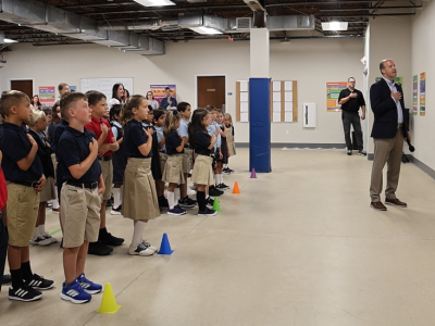 Students at an American classical school reciting the Pledge of Allegiance at morning assembly.